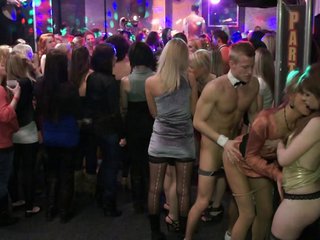 Gorgeous cowgirl getting drilled doggy flavour at a groupsex band